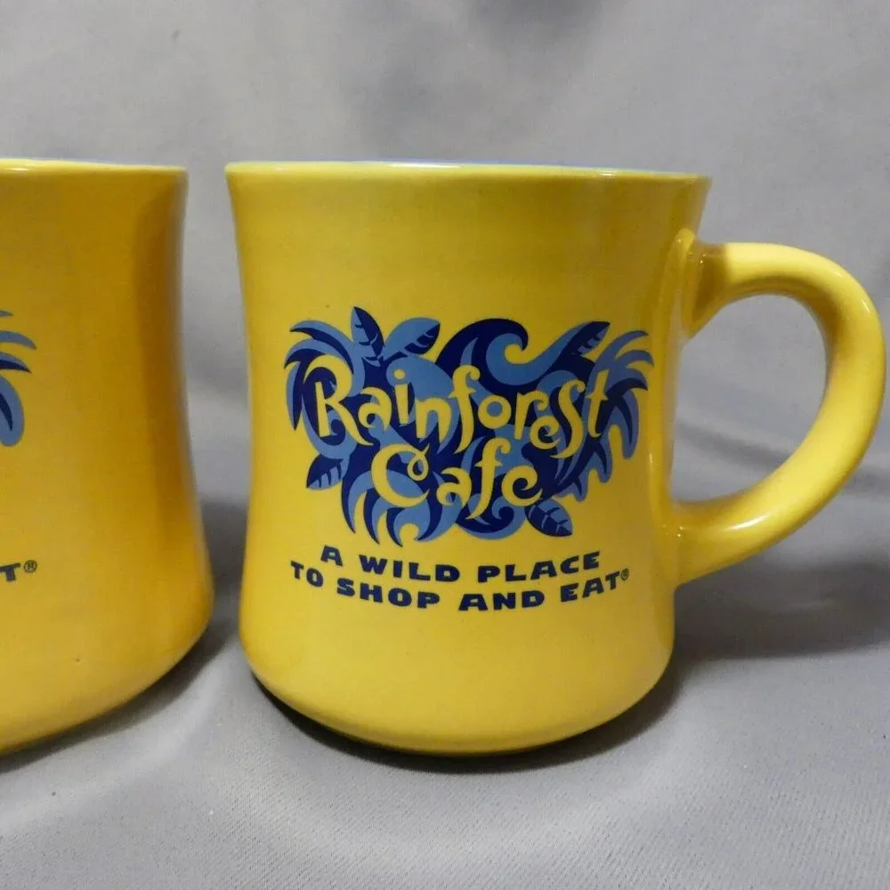 Rainforest Cafe A Wild Place to Shop and Eat Yellow and Blue 2 Coffee Mugs Heavy - Picture 4 of 12